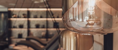 Pictures from Sportalm Modern pendant lights in a cozy interior with lounge chairs