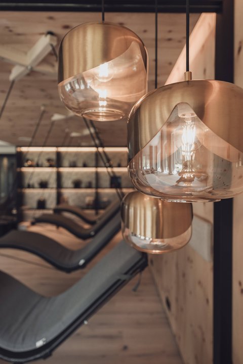 Pictures from Sportalm Modern pendant lights in a cozy interior with lounge chairs