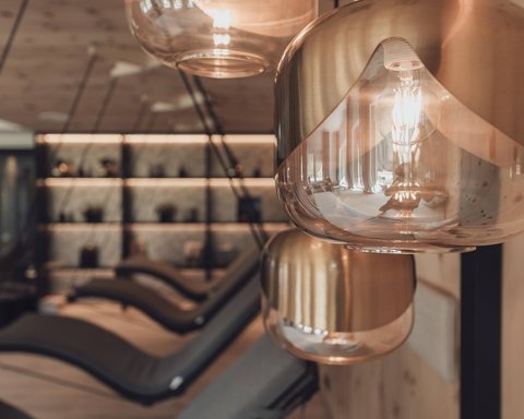 Pictures from Sportalm Modern pendant lights in a cozy interior with lounge chairs