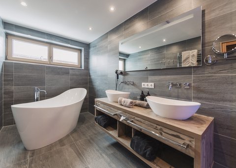 Pictures from Sportalm Modern bathroom with freestanding bathtub and double sinks