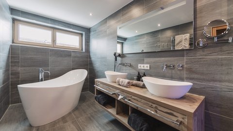 Pictures from Sportalm Modern bathroom with freestanding bathtub and double sinks