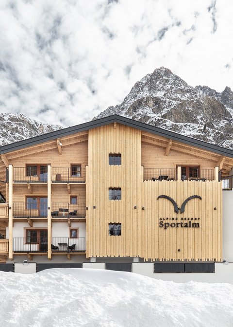 Pictures from Sportalm Alpine resort Sportalm with snowy mountains and forest background