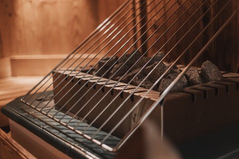 Pictures from Sportalm Sauna heater with hot stones and metal safety grate