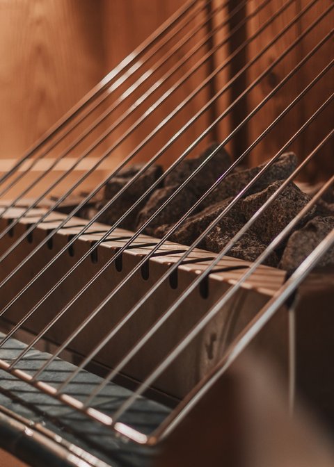 Pictures from Sportalm Sauna heater with hot stones and metal safety grate