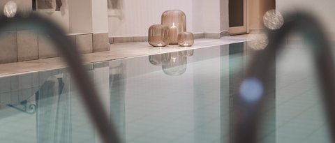 Pictures from Sportalm Indoor pool with candles in decorative lanterns on the floor