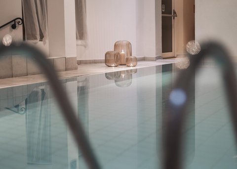 Pictures from Sportalm Indoor pool with candles in decorative lanterns on the floor