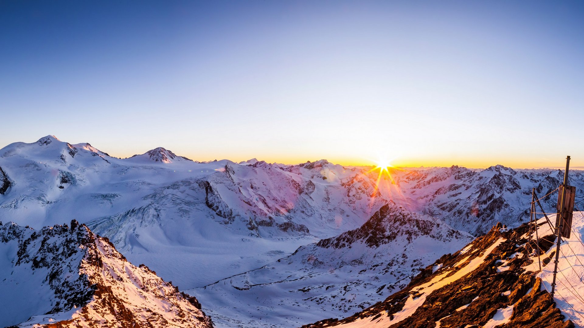 Active holidays at our sports hotel in Pitztal Sunrise over snow-covered mountains in a high mountain landscape
