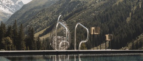 Pictures from Sportalm Pool with mountain view under sunny sky with clouds