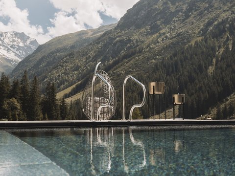 Pictures from Sportalm Pool with mountain view under sunny sky with clouds