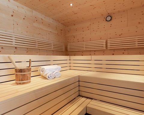 Pictures from Sportalm Inside a sauna with wooden benches, towels, and a wooden bucket