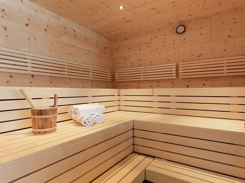 Pictures from Sportalm Inside a sauna with wooden benches, towels, and a wooden bucket