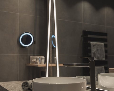 Pictures from Sportalm Modern bathroom sink with round basin and illuminated mirror