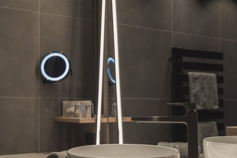 Pictures from Sportalm Modern bathroom sink with round basin and illuminated mirror