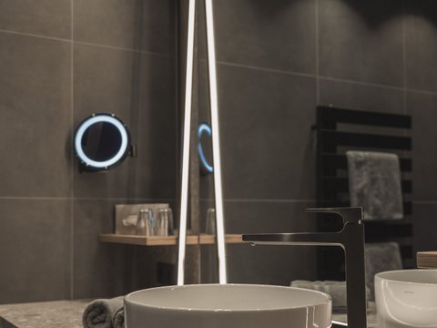 Pictures from Sportalm Modern bathroom sink with round basin and illuminated mirror