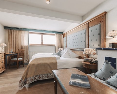 Pictures from Sportalm Cozy hotel room with wooden furniture and double bed