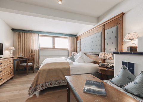 Pictures from Sportalm Cozy hotel room with wooden furniture and double bed