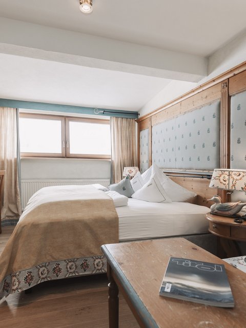 Pictures from Sportalm Cozy hotel room with wooden furniture and double bed