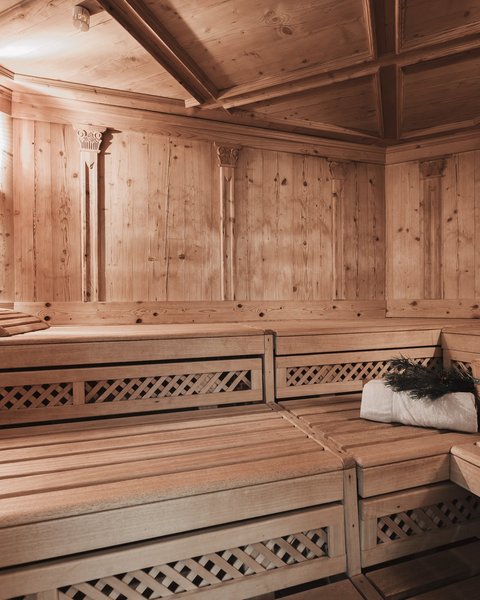 Pictures from Sportalm Wooden sauna with light, towel, bucket, and sauna whisk