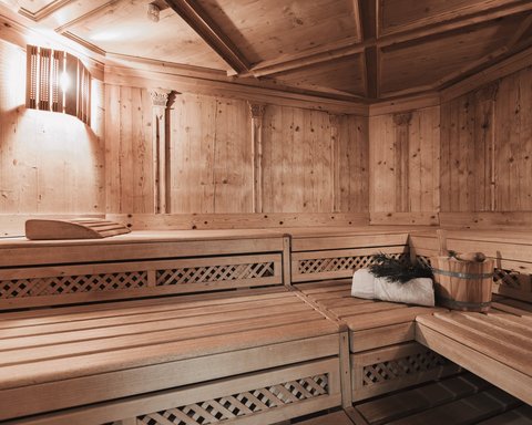 Pictures from Sportalm Wooden sauna with light, towel, bucket, and sauna whisk