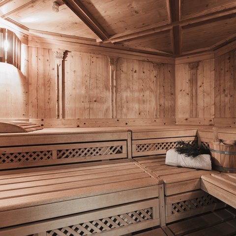 Pictures from Sportalm Wooden sauna with light, towel, bucket, and sauna whisk