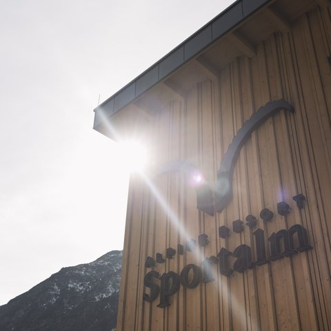 Pictures from Sportalm Building wall with Alpine Resort Sportalm sign in sunlight