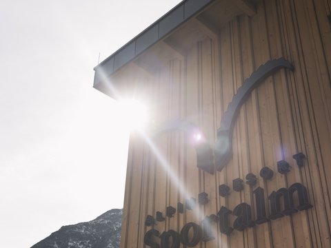 Pictures from Sportalm Building wall with Alpine Resort Sportalm sign in sunlight