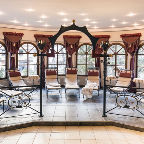 Pictures from Sportalm Calm relaxation room with lounge chairs, decorative curtains and large windows